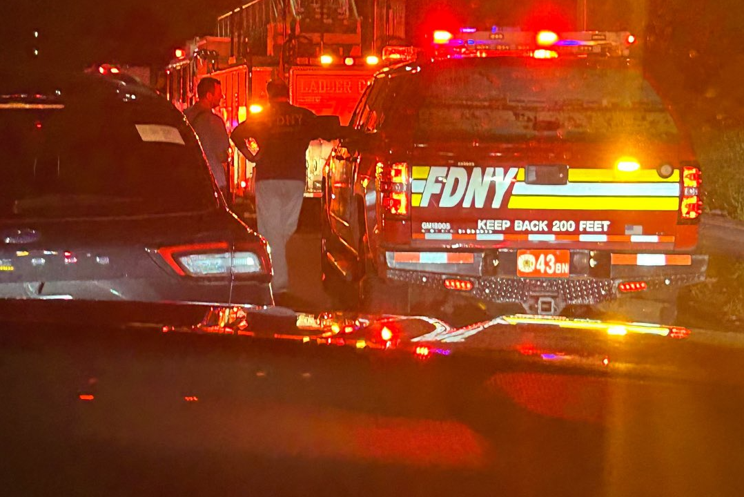 FDNY Deputy Chief George Healy stands at the scene of a vehicle collision on the Belt Parkway in Brooklyn on Aug. 12, 2024.